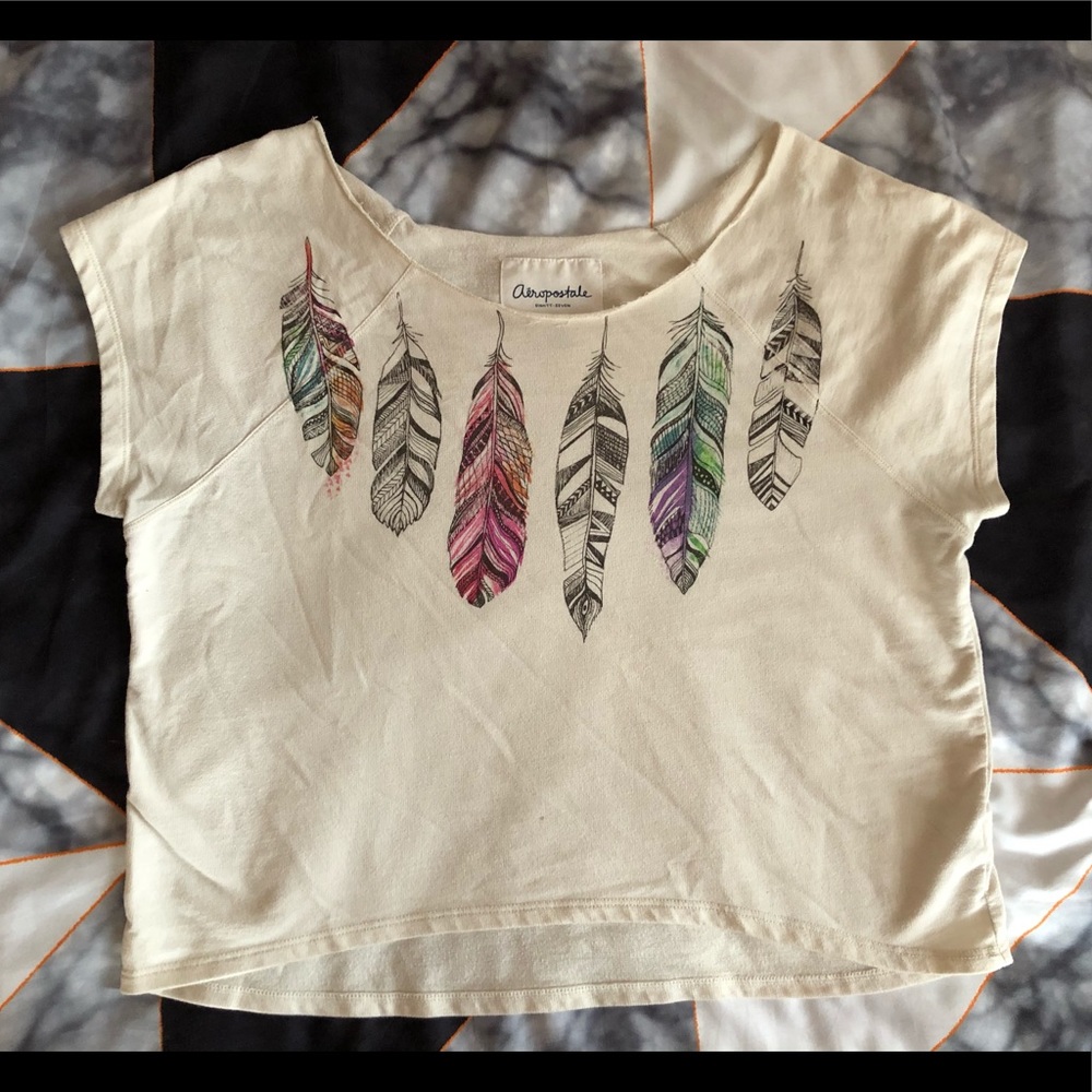 Creme crop top with colorful feathers
